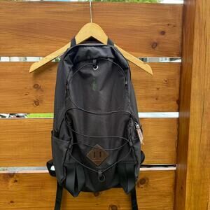 Black nylon backpack with multiple